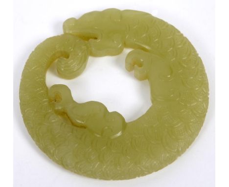 A Chinese yellow jade dragon pendant, 5 cm long  See illustration