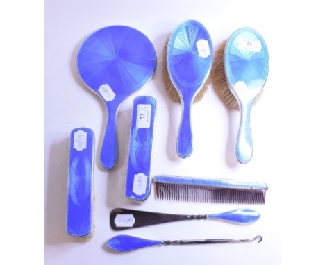 An eight piece silver and blue guilloche enamel mounted dressing table set, enamel damaged, Henry Clifford Davis, Birmingham 