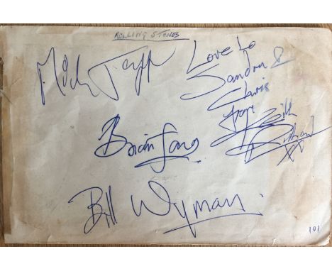 ROLLING STONES - FULLY SIGNED PAGE. A page from an autograph book, signed clearly in blue ink 'Love to Sandra & Chris' with s