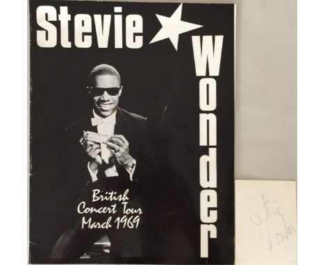 STEVIE WONDER SIGNED. Two pieces of Stevie Wonder memorabilia to include: a 2.5 x 3.5" Tamla promotional card with handwritte