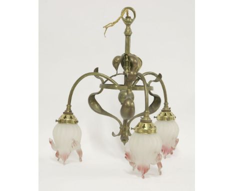 An Art Nouveau brass ceiling light,with three period shades,43cm high