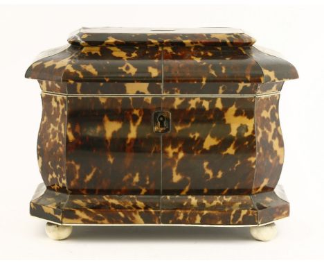 A Victorian tortoiseshell twin compartment tea caddy,  of bombé shape, with pewter stringing and ivory borders and feet,16cm 