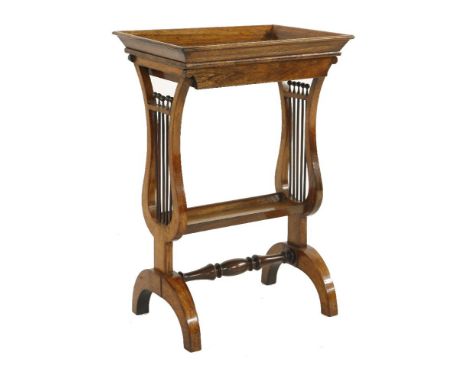 A rosewood drawer tricoteuse table,19th century, with tray top drawer, lyre end supports, lower shelf, turned stretcher and f