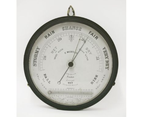A wall mounted barometer and thermometer,   by F Westley, 27 Old Bond St., London, the enamel dial in a patinated metal case,