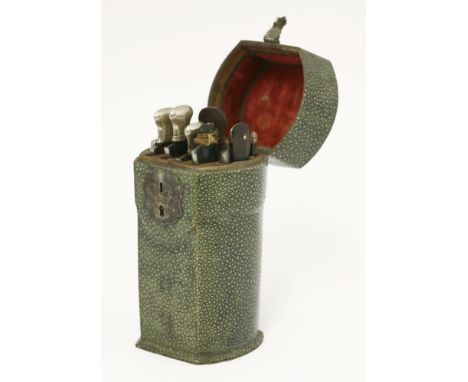 A shagreen and white metal-mounted travelling razor and toiletry set,late 18th century, comprising:six tortoiseshell cut-thro