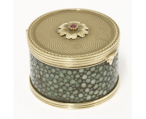A shagreen and gold metal-mounted miniature powder box,the engine turned lid tests 15ct, centred with a flowerhead inset with
