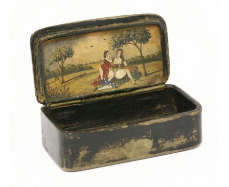 An erotic papier mâché snuff box,early 19th century, the interior of the lid painted with a couple making love in parkland,7.