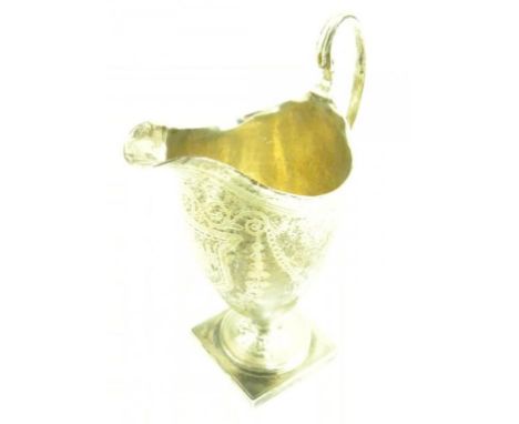 A GEORGE III SILVER HELMET SHAPED CREAM JUG, ON SQUARE FOOT, LONDON 1793, 3OZS