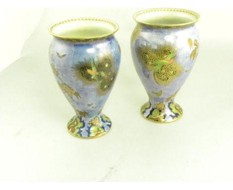 A PAIR OF CARLTON WARE PARADISE BIRD AND TREE PATTERN VASES WITH MOTTLED LIGHT BLUE GROUND