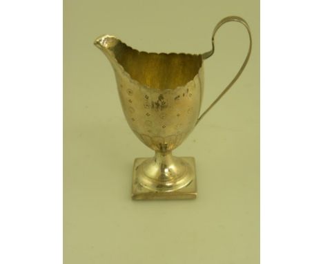 A GEORGE III SILVER HELMET SHAPED CREAM JUG ON SQUARE FOOT, LONDON 1795, 2OZS