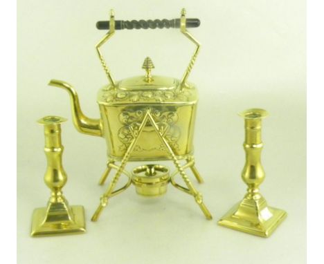 A LATE VICTORIAN BRASS SPIRIT KETTLE ON LAMP STAND AND A PAIR OF VICTORIAN BRASS CANDLE STICKS