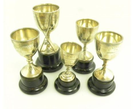 FIVE  SILVER TROPHY CUPS, VARIOUS SIZES, MAKERS AND DATES
