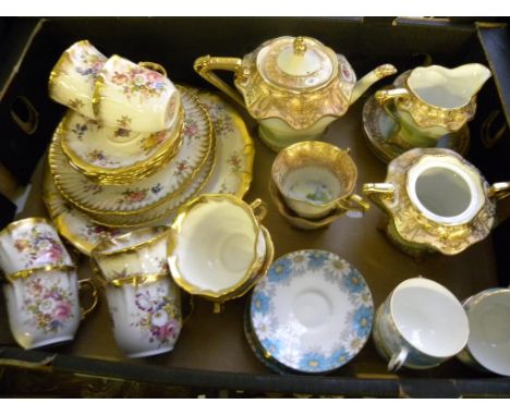 A HAMMERSLEY FLORAL TEA SERVICE, A NORITAKE RICHLY GILT TEA SERVICE PAINTED WITH LANDSCAPES AND A SET OF FOUR PARAGON MARGARE