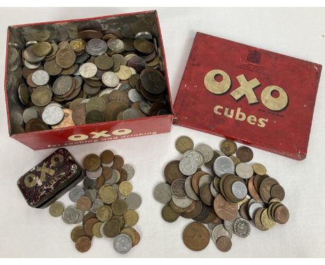 2 vintage Oxo Cube tins containing a collection of antique and vintage British and foreign coins. To include sovereign heads 