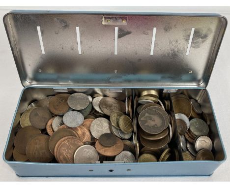 A vintage blue metal savings tin containing a collection of vintage British and foreign coins. To include sovereign heads of 