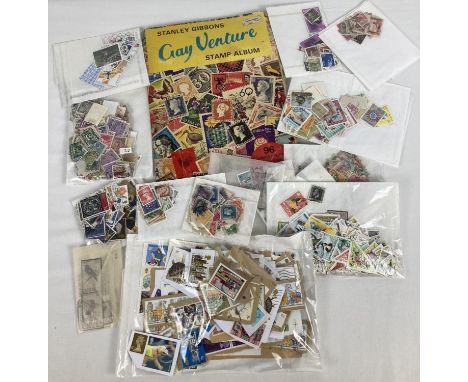A Stanley Gibbons Gay Venture stamp album containing assorted vintage world stamps. Together with a box of misc loose world s