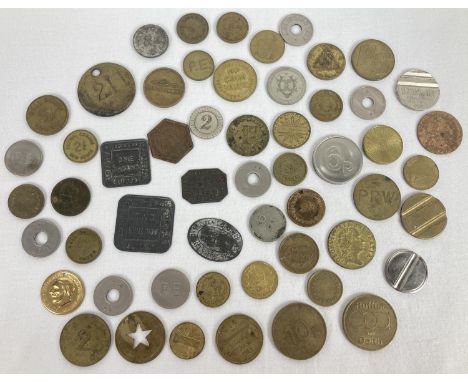 A collection of antique and vintage metal tokens. To include: George III Beechcroft and Sons, William Bros Stores Ltd, London
