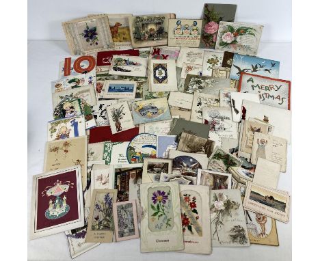 A box of 100+ antique and vintage greetings cards to include silk, children's birthdays, Christmas and souvenir. 