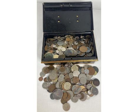 A vintage tin containing a collection of British and foreign antique &amp; vintage coins in varying conditions. To include Ge