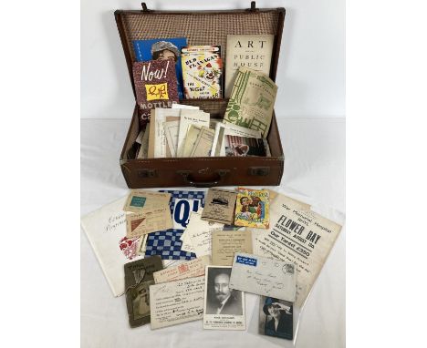 A small vintage leather suitcase containing a collection of mixed vintage ephemera. To include product brochures, motor cycle