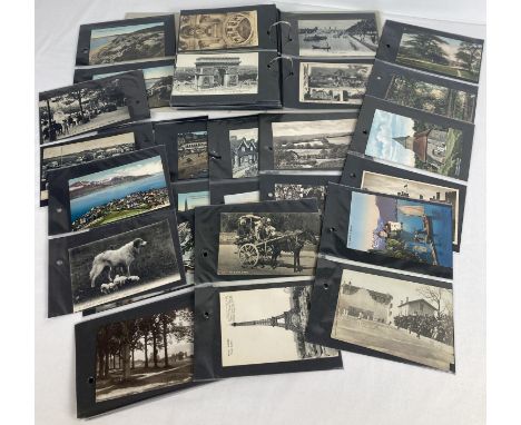 An album containing approx. 150 assorted Edwardian &amp; vintage British and Overseas postcards. To include RP's, street scen