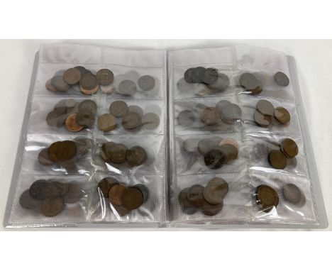A large folder containing a collection of antique and vintage British coins. To include sovereign heads of: Victoria, Edward 