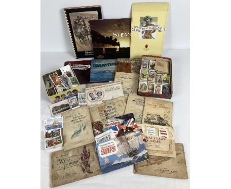 A box of assorted vintage cigarette &amp; cigar albums and cards. To include: Kensitas flags silks, Ritmeester cigar band alb