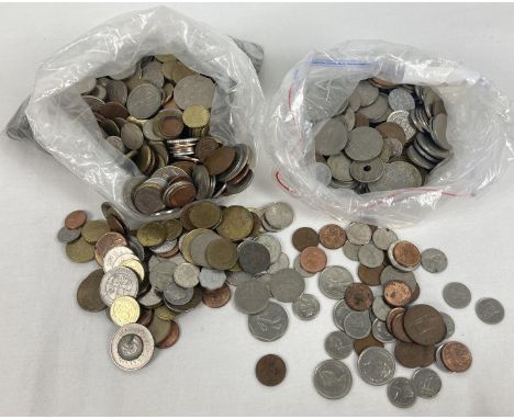 A collection of vintage foreign coins to include British territories. Lot includes examples from: Canada, Barbados, Papua New