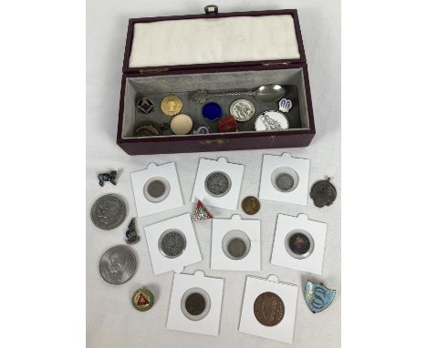 A small red box containing a collection of antique and vintage British and foreign coins. To include commemorative crowns, me