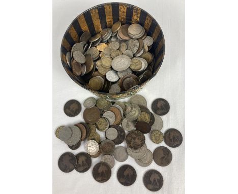 A collection of antique and vintage British and foreign coins. To include young head and veiled head Victorian pennies. 