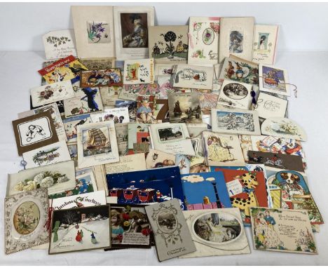 A quantity of 125+ antique &amp; vintage greetings cards in varying styles &amp; designs. Mostly Christmas, New Year and birt