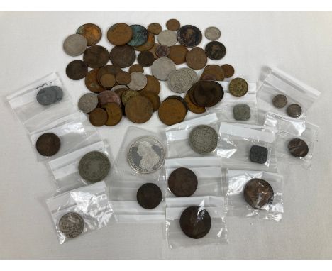 A collection of assorted vintage &amp; antique British and foreign coins. To include: silver threepences, Victorian &amp; Edw