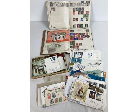 2 small vintage stamp albums containing used British and world stamps together with a collection of loose stamps and first da
