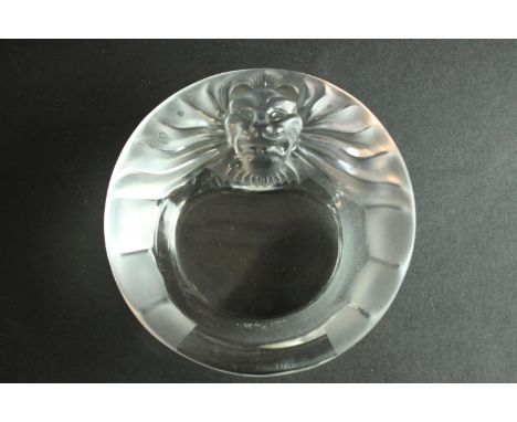A vintage Lalique raised lion head clear crystal ashtray. Signed to the base, France. H.5 Dia. 15cm. 