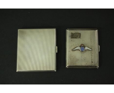 Two vintage silver cigarette cases. One with an enamel Sweetheart RAF badge and one with an engraved monogram and engine turn