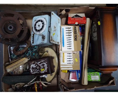 Two boxes containing a good mixed lot of vintage items to include a fuel stove, scales, dressing table set, vintage stationer