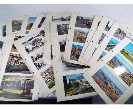 A collection of approximately 100 mid period postcards depicting buses, trams and steam locomotives, a quantity of UK mint st