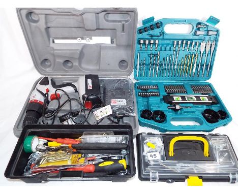 A Performance powered 18v cordless hammer drill PHD 18A - 2, in protective case, a Makita drill and screwdriver set and a too