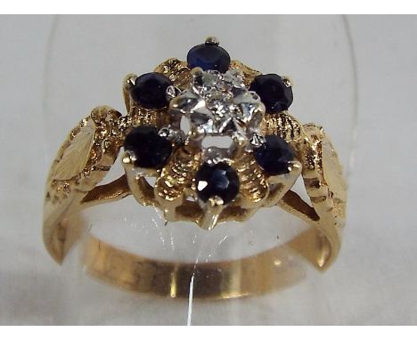 A 9 carat yellow gold sapphire and diamond cluster ring size P, approximate weight 3.08 grams, boxed. Estimate £40 - £60