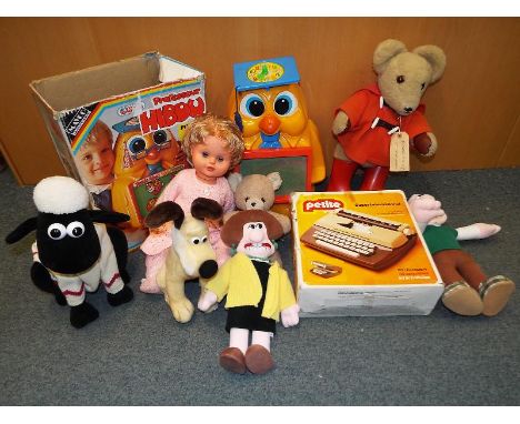 A Petite typewriter, a Professor Hibou Shaun the Sheep from Wallace and Gromit and similar