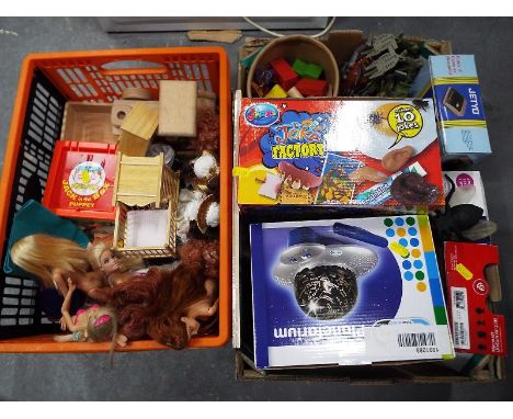 Two boxes of mixed children's toys to include collector dolls, a vintage Fisher Price Jack- in -the- Box puppet, The Joke Fac