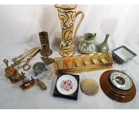 A good mixed lot of ceramics and other to include Wedgwood, Wade, two Goebel Hummel figurines an aneroid barometer, ornamenta