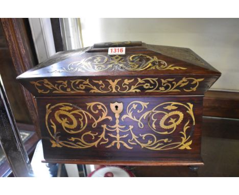 A George IV/William IV rosewood and brass inlaid sarcophagus tea caddy,&nbsp;34cm wide, (s.d.). 