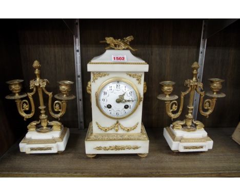 A late 19th century marble and gilt brass clock garniture,&nbsp;the clock 28.5cm high. 