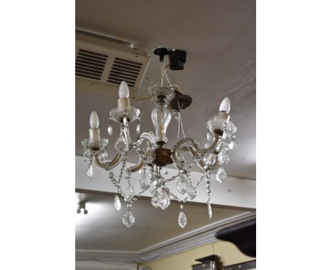 An old glass and brass five branch chandelier.&nbsp; 