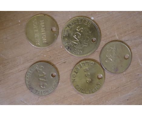 Of Mining Interest: five various brass colliery lamp checks or tallies,&nbsp;comprising: Manton; Bevercotes; North Notts; Har
