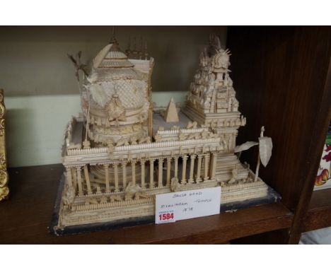 An antique balsa wood model of an Indian temple, 39.5cm wide. 