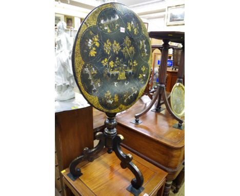 A Victorian papier mache circular tilt top tripod table, stamped 'Jennens X Bettridge', 58cm diameter. 