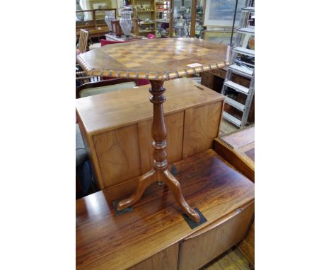 A Victorian walnut and chequerboard inlaid octagonal tripod table,&nbsp;47cm wide.&nbsp; 