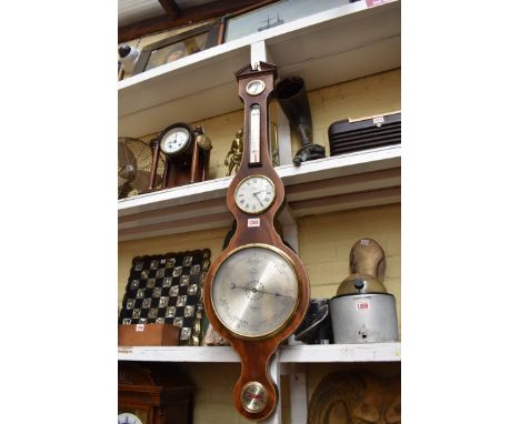 A mahogany and tulip wood crossbanded five dial combined clock and banjo barometer, by Comitti. 
